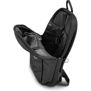 A grey Swiss Peak RFID backpack with multiple compartments and an open zipper, showcasing its interior pockets.