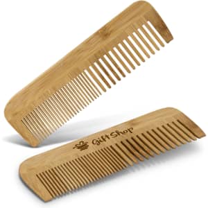 Two bamboo hair combs in a light brown colour, featuring a logo on one side.