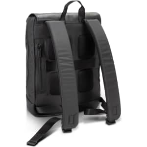 A black Moleskine Metro Slim Backpack featuring padded straps and a sleek design, with a logo on the surface.