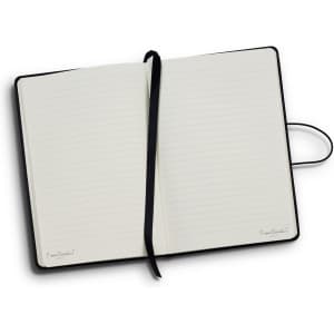 A black Pierre Cardin Biarritz notebook with lined pages and a ribbon bookmark. Features a logo on the bottom corner.