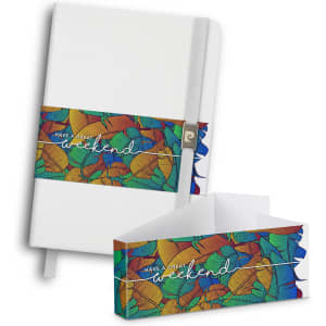 A white notebook with a vibrant, patterned band featuring shades of orange, green, and blue. Includes a logo.