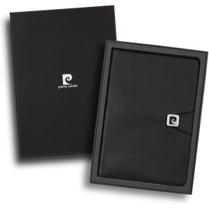 A black notebook gift set presented in a sleek black box, featuring a minimalistic logo.