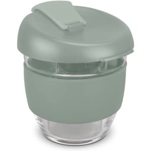 A drink bottle featuring a clear borosilicate glass body with a green silicone lid and sleeve. It has a logo.