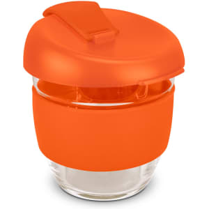 A drink bottle with an orange silicone lid and base, featuring a clear borosilicate glass body.