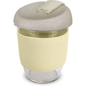 A drink bottle featuring a light yellow body with a textured silicone grip and a grey, textured lid. It has a logo.