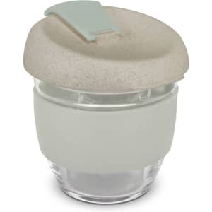 A drink bottle with a clear base and a light grey silicone sleeve, featuring a beige lid and a logo.