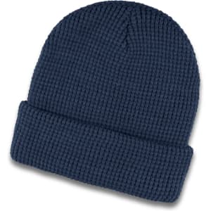 A navy blue waffle beanie featuring a textured knit design and a folded cuff. It has a small logo.