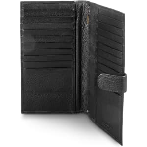 A black leather passport wallet featuring multiple card slots and a secure closure.