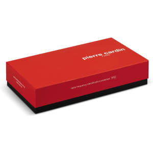 A red gift box containing a Pierre Cardin leather wallet and belt set, featuring RFID protection.