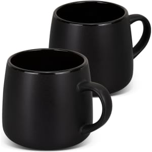 A set of two black coffee mugs with a smooth finish and rounded design. Each mug features a handle.