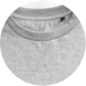 A light grey unisex sweatshirt with a contrasting grey neckline and visible stitching details. Features a logo tag inside.