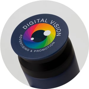 A drink bottle featuring a dark blue body and a circular lid with a colourful logo and branding.