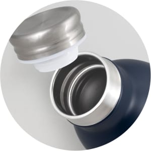 A drink bottle in navy blue with a stainless steel lid, showing the interior and opening of the bottle.