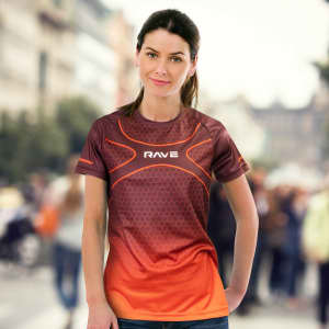 A women's performance t-shirt featuring a red and orange gradient design with a logo on the front.