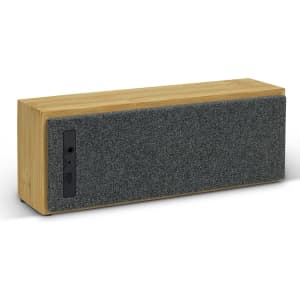 A wooden Bluetooth speaker featuring a grey fabric front and a black control panel on the side.