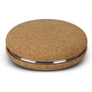 A round cork compact mirror with a sleek metal edge, featuring a natural cork surface.