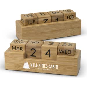 A bamboo desk calendar featuring wooden blocks for days and months, with a logo displayed on the base.