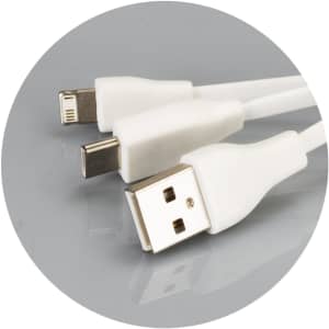 A rectangular bamboo charging cable key ring in white with USB and Lightning connectors. Features a logo.
