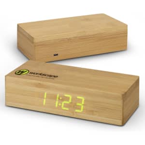 A bamboo wireless charging clock with a digital display, featuring a branding logo on the front.