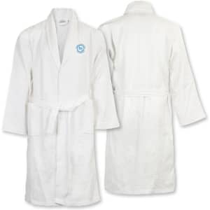 A white waffle bathrobe featuring a belt and a logo on the chest. It has a relaxed fit and long sleeves.