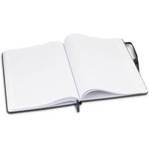A large black hardcover notebook with blank lined pages, open to display the interior.