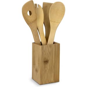 Bamboo kitchen utensils in a standing holder, featuring a spatula, spoon, and fork, all in natural bamboo colour.