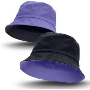 A reversible bucket hat featuring purple on one side and black on the other. It has a logo on it.