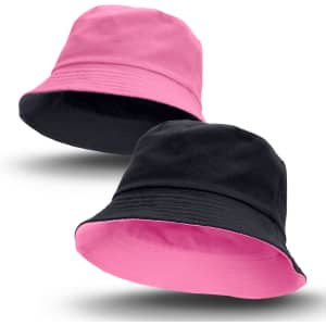A reversible bucket hat in black and pink, featuring a logo, showcasing both colour options.