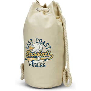 A cream-coloured canvas barrel bag with a rope handle and a logo featuring an eagle and text.