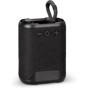 A black Bluetooth speaker with a textured surface and a looped attachment for easy carrying.