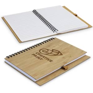 A medium bamboo notebook with a spiral binding, featuring a textured wooden cover and lined pages inside.