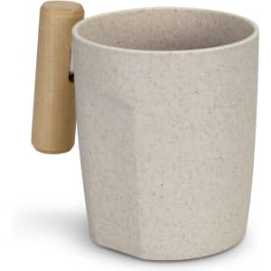 A coffee mug featuring a speckled beige design with a wooden handle. It has a unique, geometric shape.