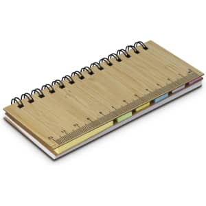 A bamboo sticky note wallet with spiral binding, featuring a ruler and assorted pastel sticky note flags.