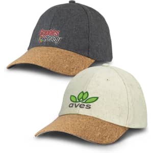 A grey and a light cream cap with cork brims, each featuring a logo on the front.
