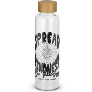 A clear glass drink bottle with a bamboo lid, featuring a floral design and printed words in black.
