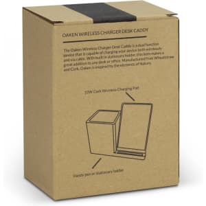 A brown cardboard box containing the NATURA Oaken Wireless Charger Desk Caddy, featuring a cork charging pad and stationery holder.