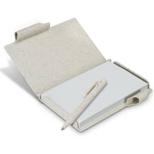 A natural-coloured notebook with a speckled design, featuring a matching pen attached.