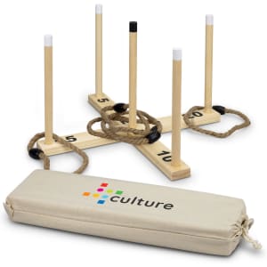 A ring toss game with wooden posts, a base, and rope rings, featuring a beige storage bag with a logo.