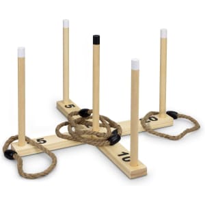A wooden ring toss game with four upright poles, two ropes, and a base marked with numbers. The poles are black and white.