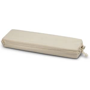 A rectangular, natural canvas bag with a drawstring closure, featuring neutral tones and a simple design.