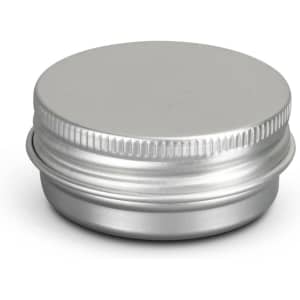 A silver lip balm tin with a smooth, rounded top and a ribbed edge. It has a minimalist design and a logo.
