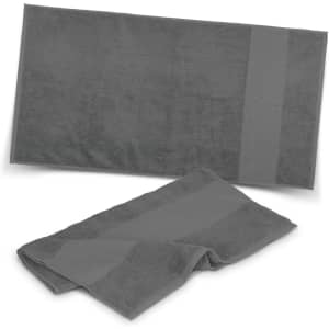 A grey fitness towel set, featuring a large towel and a smaller towel, with a sleek design and a logo.