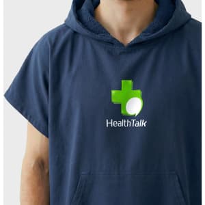 A navy hooded towel featuring a front pocket and a logo. The fabric appears soft and absorbent.
