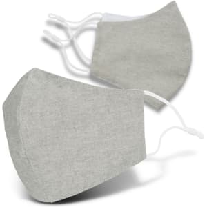 Two light grey linen face masks with adjustable ear straps, featuring a subtle texture and streamlined shape.