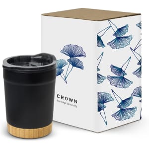 A double wall cup in black with a textured gold base, accompanied by a decorative box featuring a floral design.