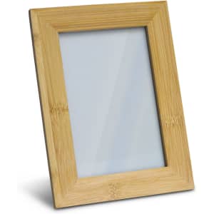 A wooden photo frame in a light bamboo finish with a rectangular shape and a glass front.
