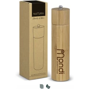 A bamboo pepper mill in natural colour with a wooden cap, packaged in a recyclable box featuring a logo.