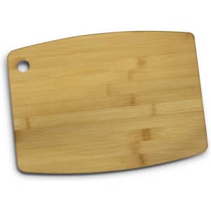 A bamboo chopping board in a natural wood colour with a rounded edge and a hole for hanging.