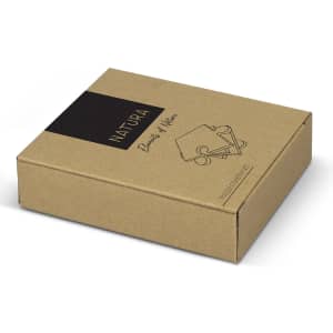 A brown cardboard box containing the NATURA Puzzle Coaster Set of 4, featuring a simple illustrated design.
