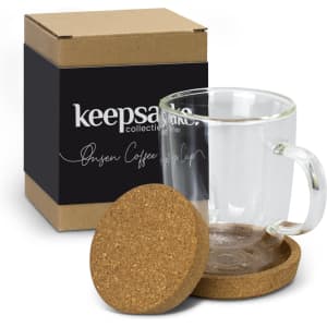 A glass coffee cup with a cork coaster, packaged in a cardboard box. The cup has a transparent design.